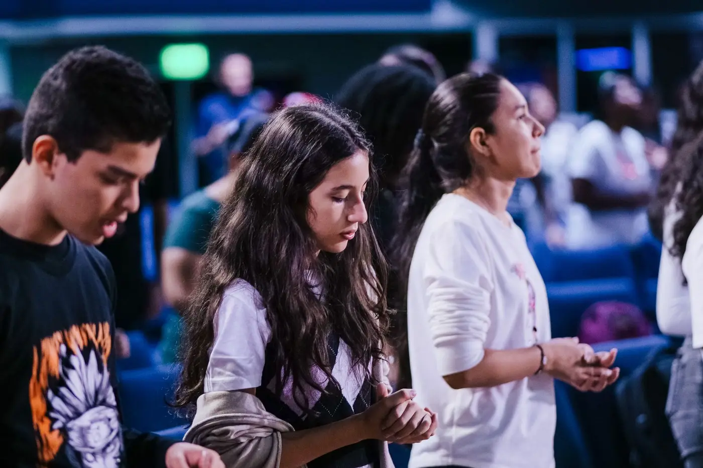 Young adults gathered together during a church service