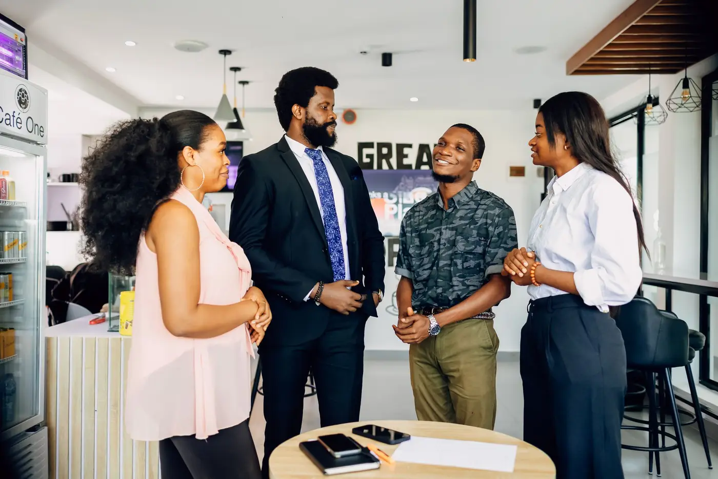 Colleagues talking together in an office
