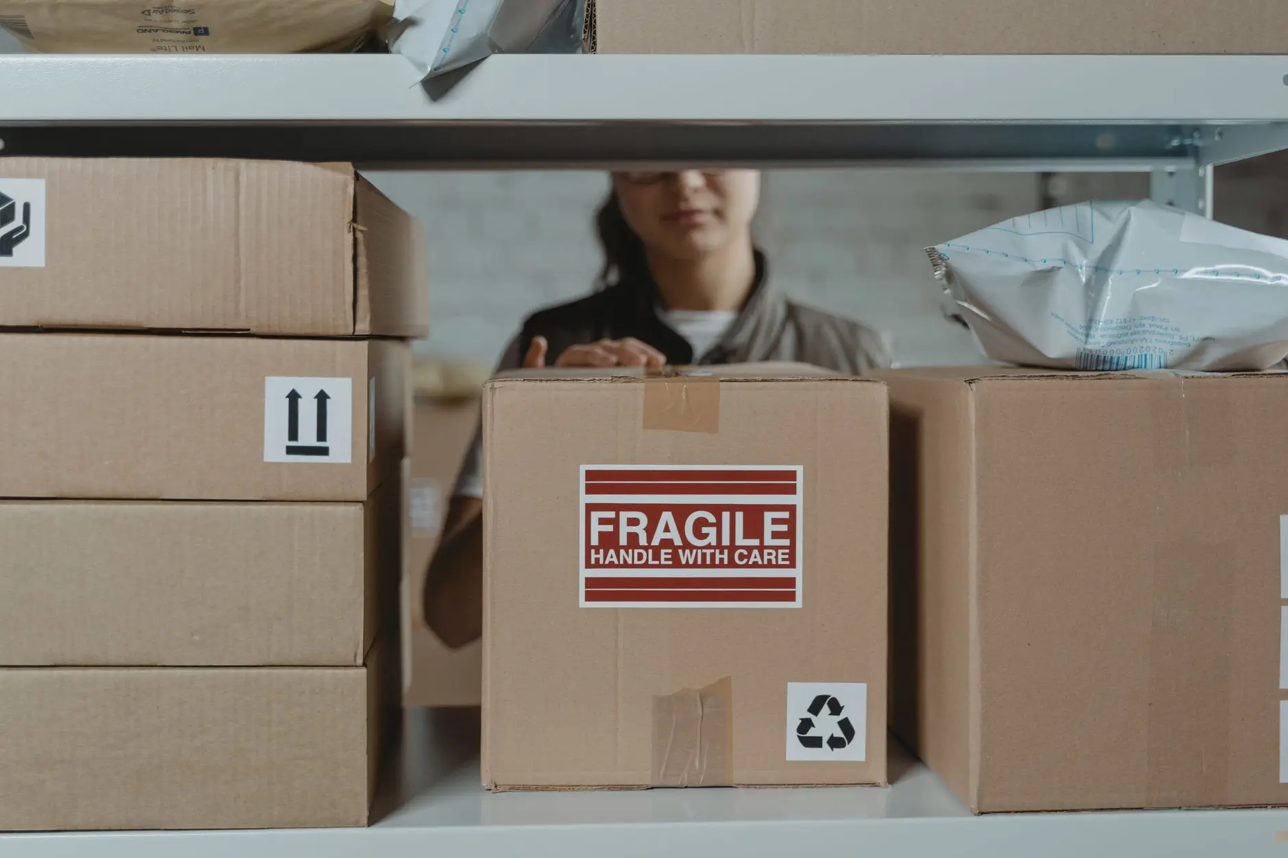 Branded gift orders packed into shipping boxes for fulfillment