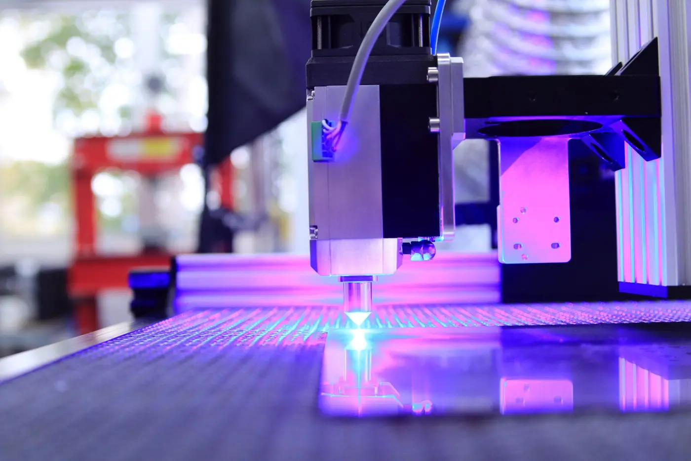 A laser engraving machine cutting a design