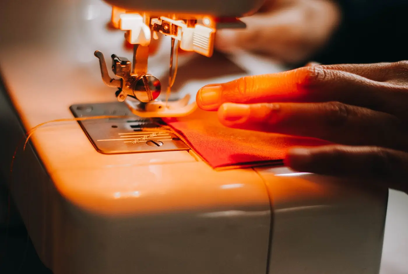 Fabric being fed through a sewing machine